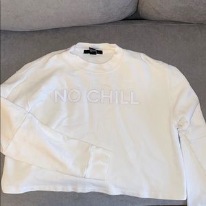 Cropped long sleeved sweater